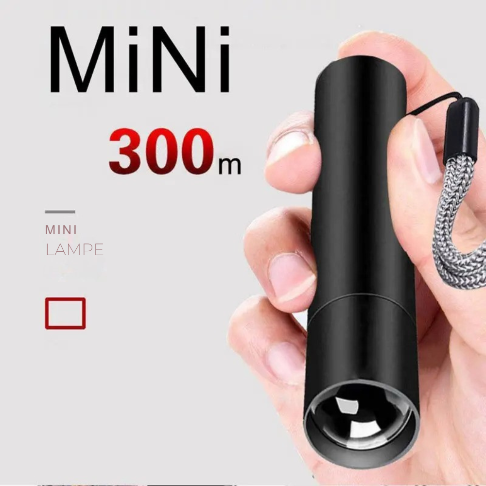 Mini lampe torche LED puissante avec portée de 300 mètres, idéale pour la randonnée et le camping.